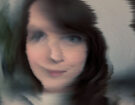 a woman with a blurry face