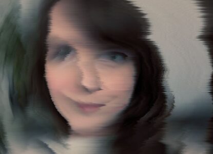 a woman with a blurry face